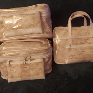 Cosmetic/travel bags (3)